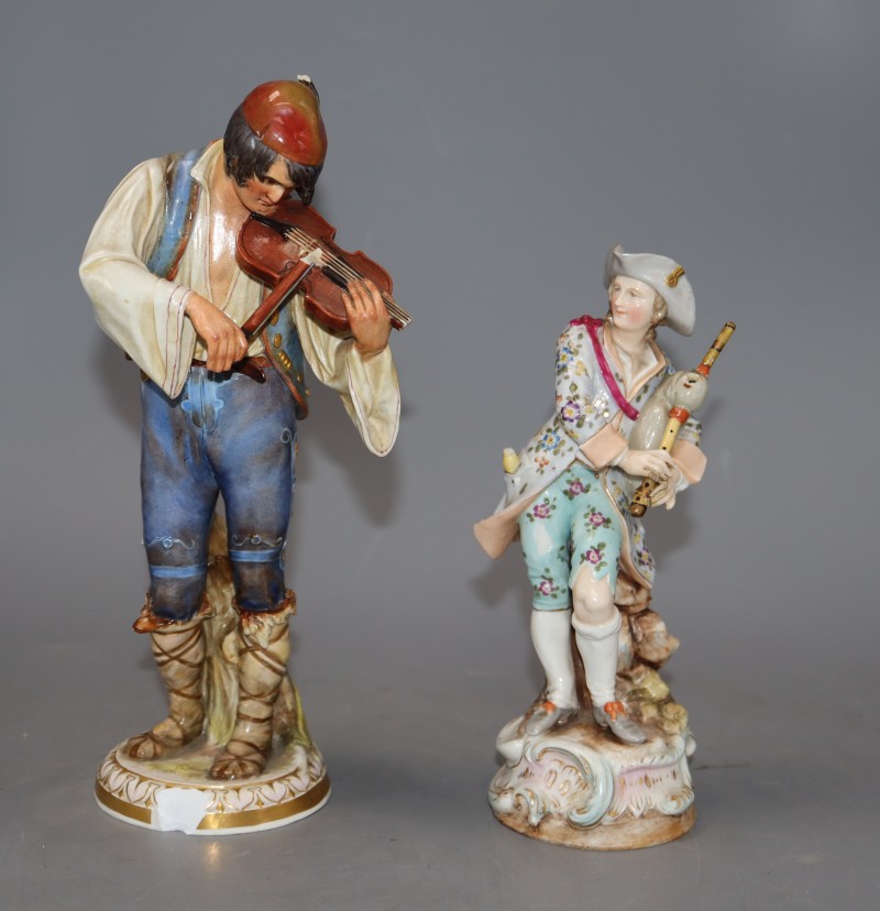 A Meissen figure of a fiddler, model R147 and another porcelain figure, tallest 24cm